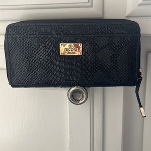 Nicole Miller black zipper wallet.